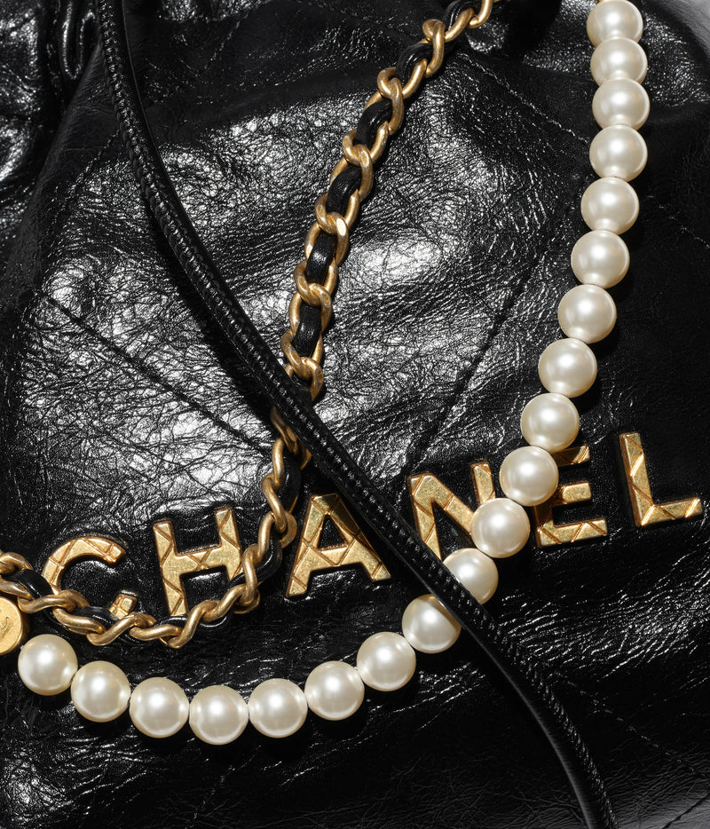 Chanel 22 Handbag Shiny Calfskin Gold AS3261 Purple in 2023